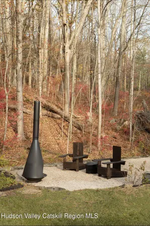 a view of a wooden house with a snow