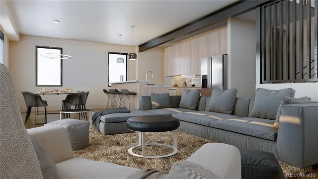 a living room with furniture a large window and wooden floor