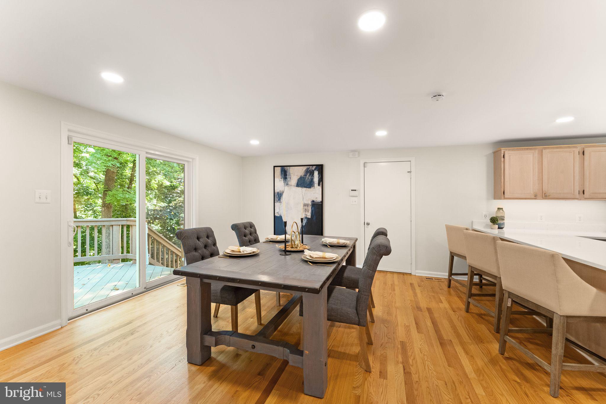 38620 Lime Kiln Road Leesburg, VA 20175 - Photo 39 of 87 a view of a dining room with furniture window and wooden floor