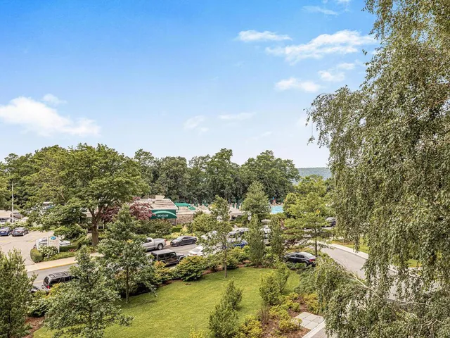 a view of residential houses with outdoor space