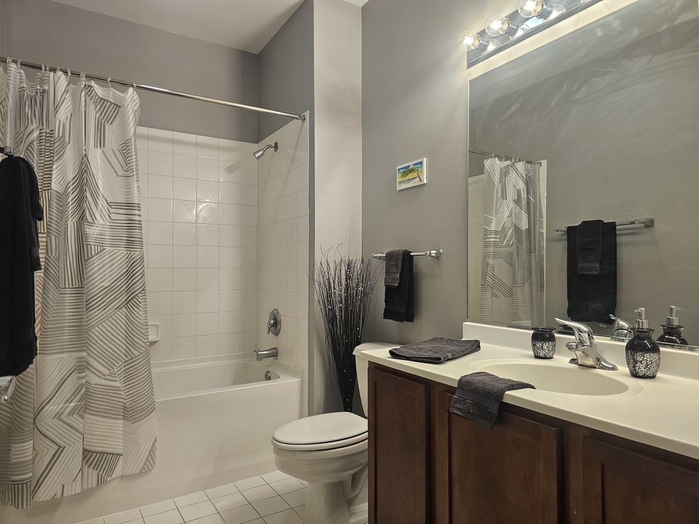 2323 West Pershing Road, Unit 230 Chicago, IL 60609 - Photo 24 of 30 a bathroom with a sink toilet and shower