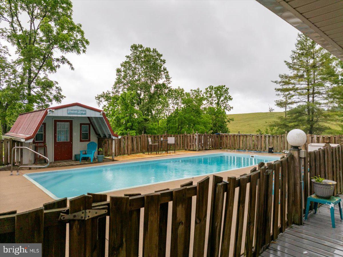11419 Oak Grove Road Bristol, VA 24202 - Photo 3 of 36 a view of a deck and yard with green space