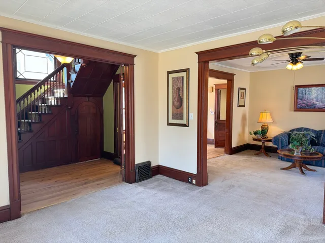 a view of livingroom with furniture and staircase
