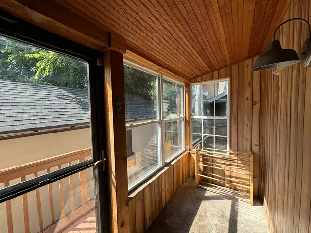 a view of a house with a large window