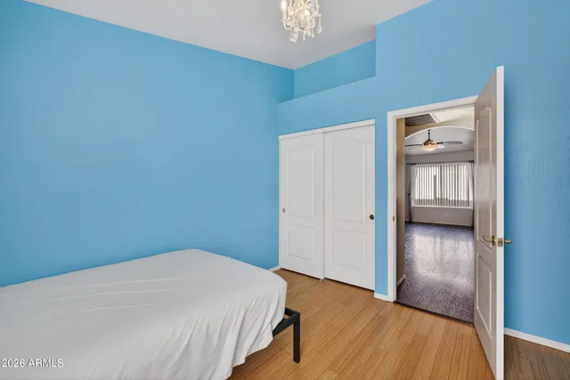 a bedroom with a bed and bathroom