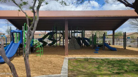 a view of a yard with patio