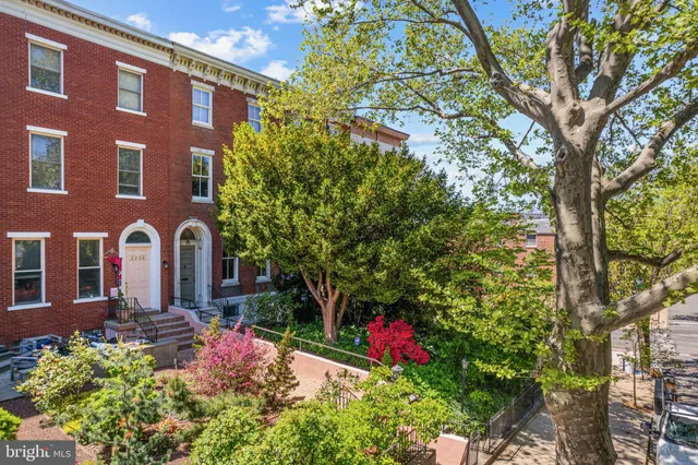 a front view of a multi story residential apartment buildings