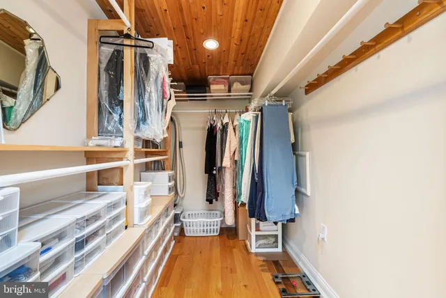 a kitchen with a refrigerator sink and stove