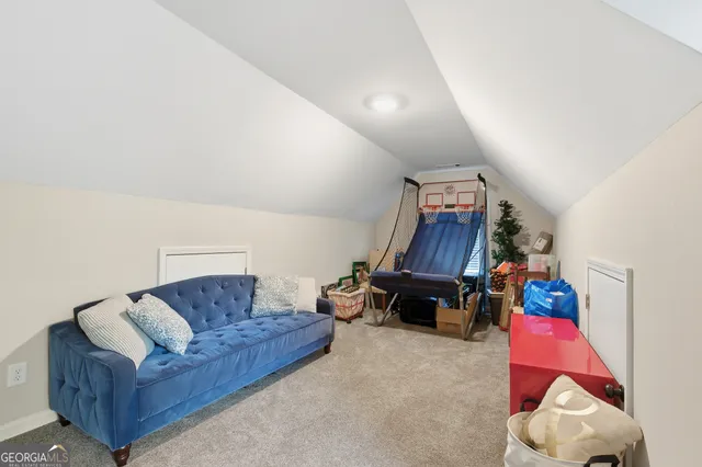 a living room with furniture and a couch