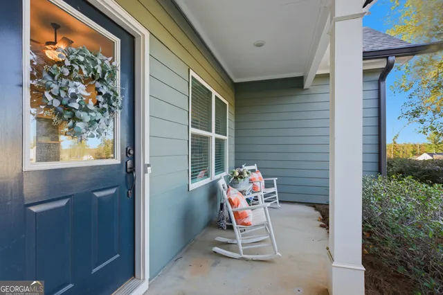a view of sitting area with furniture and toys