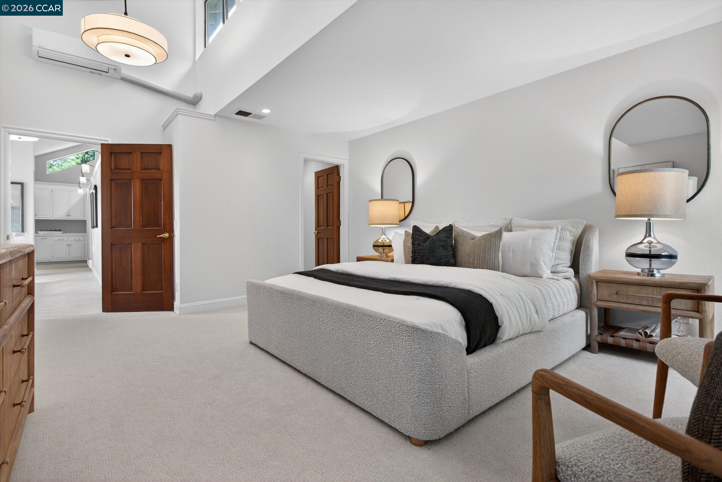 4105 Coralee Lane Lafayette, CA 94549 - Photo 27 of 43 a bedroom with bed and a chandelier