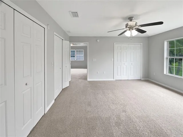 a bathroom with a toilet a sink and bathtub