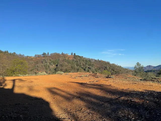 a view of an outdoor space with mountain view