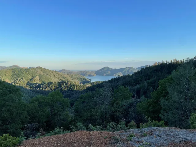 a view of a city with mountains in the background