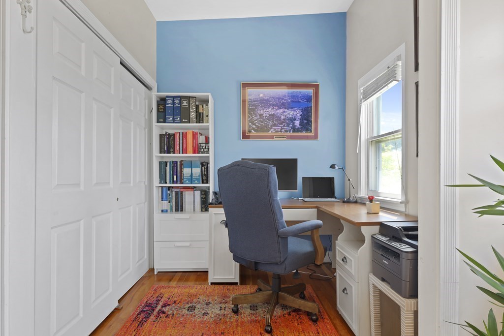 522 East 8th Street, Unit 3 Boston, MA 02127 - Photo 4 of 16 a view of a workspace with furniture and a window