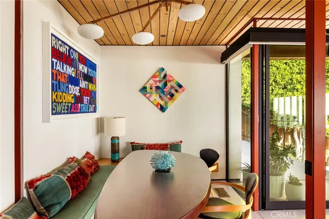 a blue table sitting next to a window