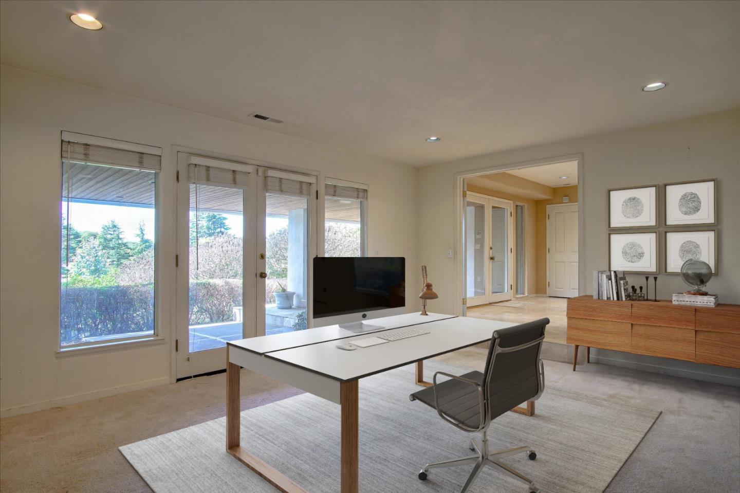 3435 Rio Road Carmel, CA 93923 - Photo 13 of 69 a view of a workspace with furniture and window
