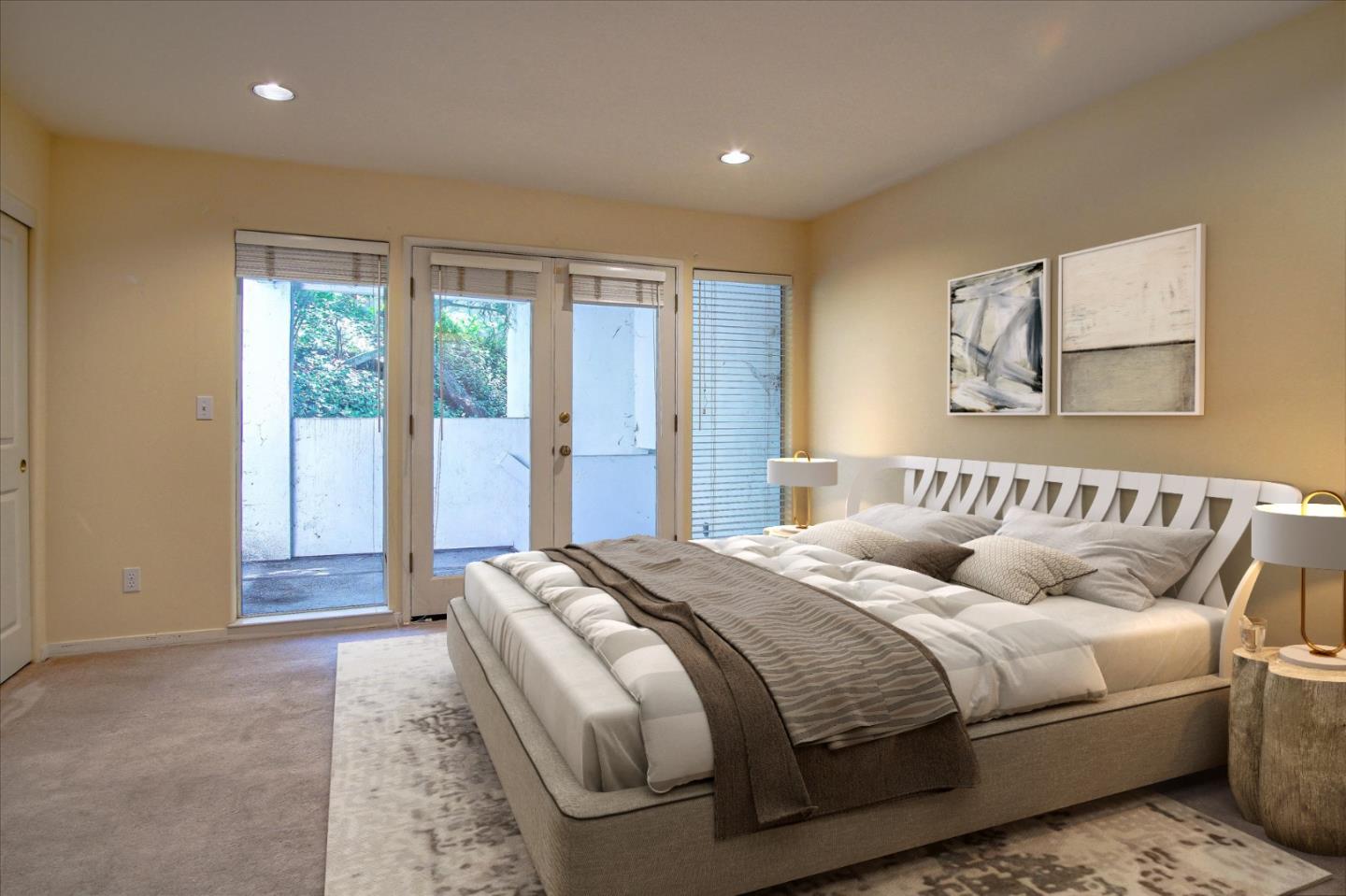 3435 Rio Road Carmel, CA 93923 - Photo 15 of 69 a bedroom with a bed and glass window