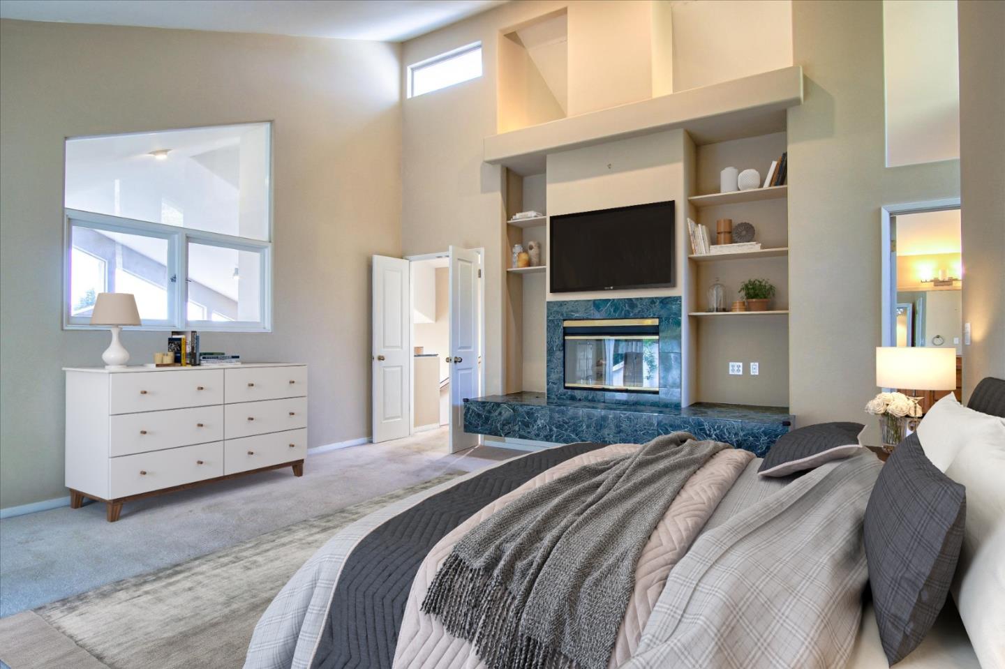 3435 Rio Road Carmel, CA 93923 - Photo 17 of 69 a bedroom with a bed and flat screen tv