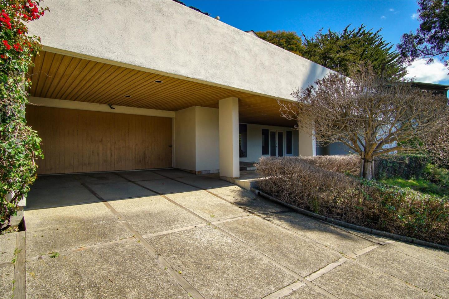 3435 Rio Road Carmel, CA 93923 - Photo 23 of 69 a front view of a house with a garage