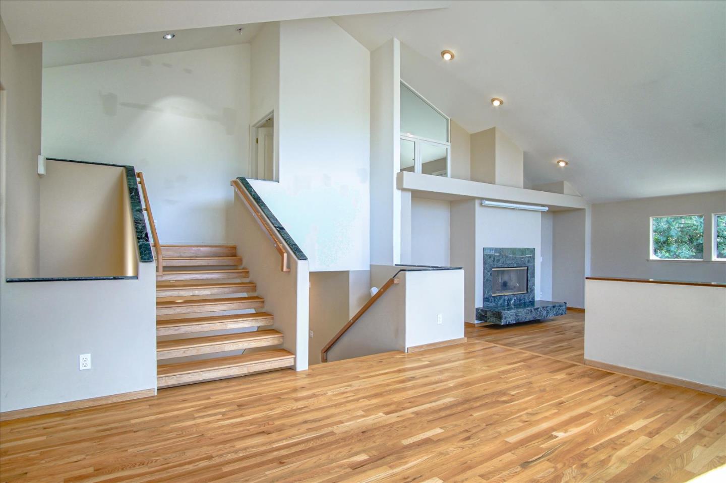 3435 Rio Road Carmel, CA 93923 - Photo 29 of 69 a view of a living room with furniture and a kitchen