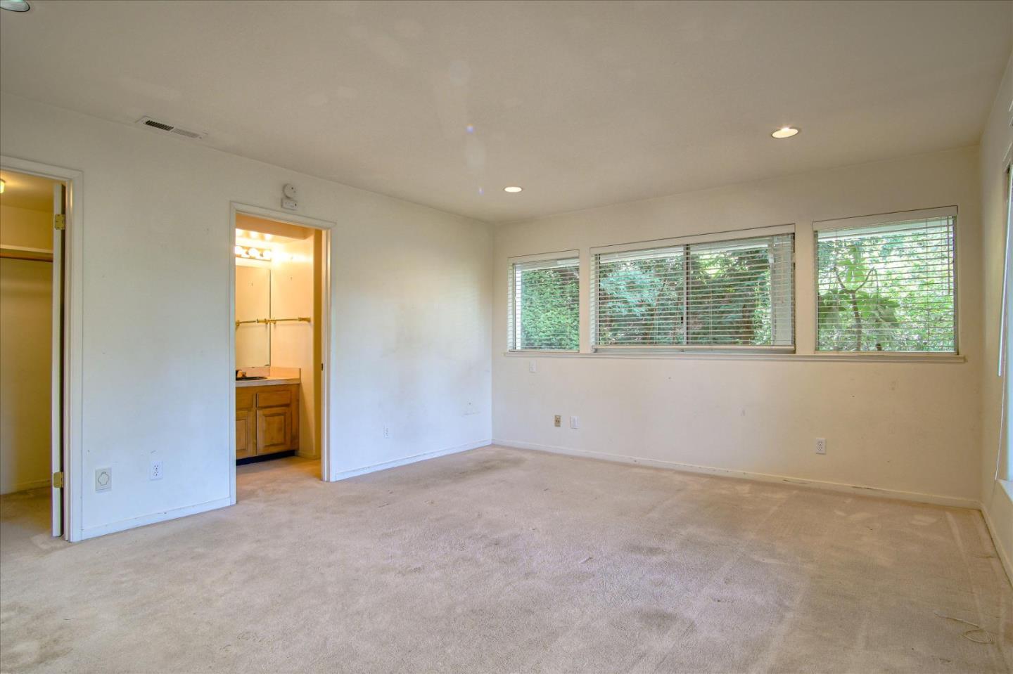 3435 Rio Road Carmel, CA 93923 - Photo 44 of 69 an empty room with windows