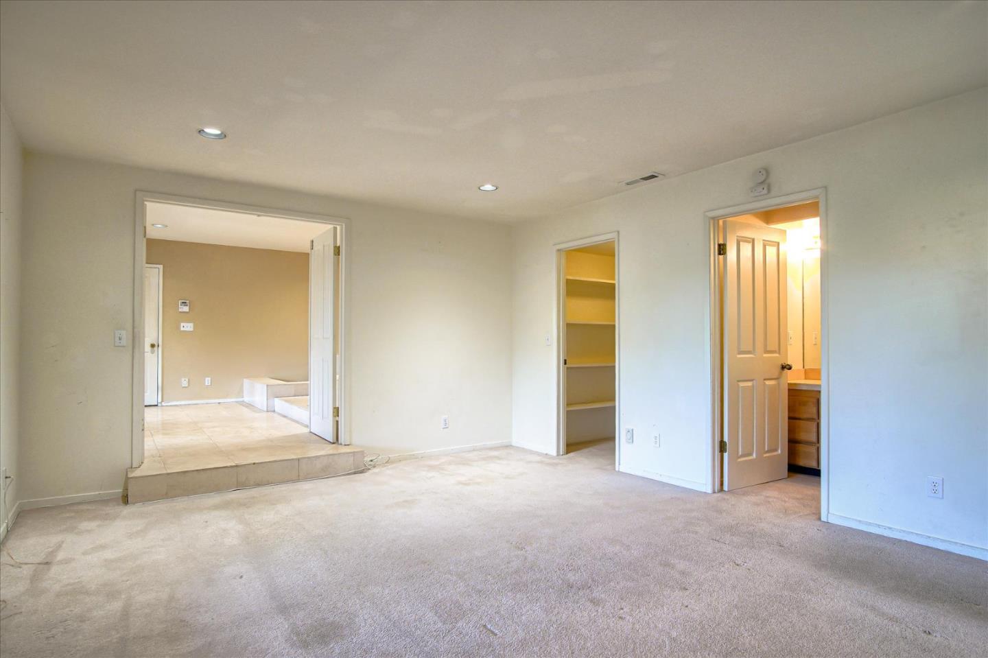 3435 Rio Road Carmel, CA 93923 - Photo 45 of 69 an empty room with a bathroom and mirror