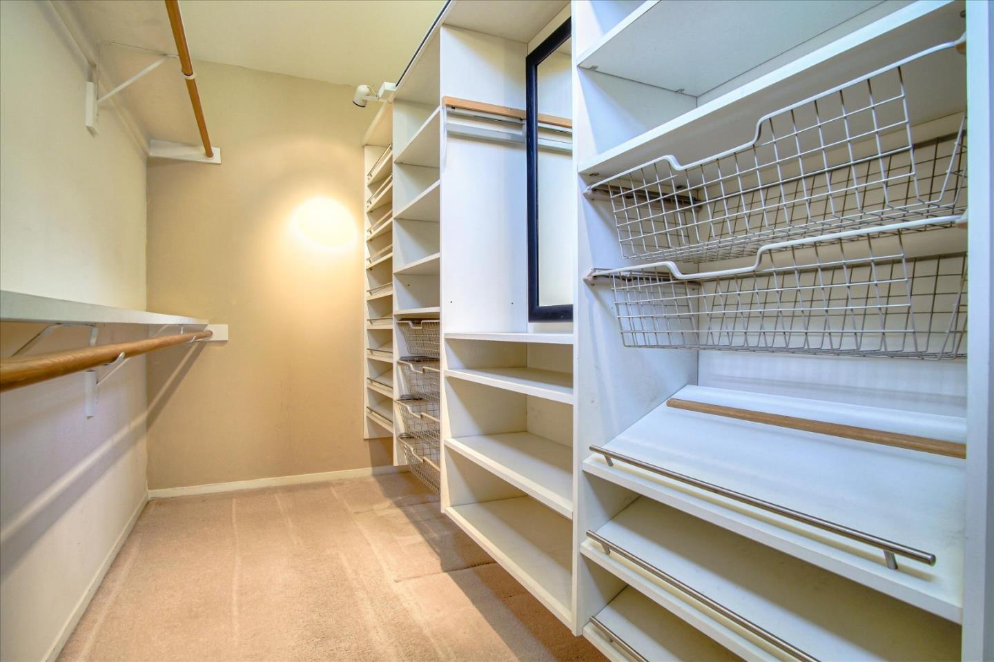 3435 Rio Road Carmel, CA 93923 - Photo 51 of 69 a view of walk in closet with empty racks