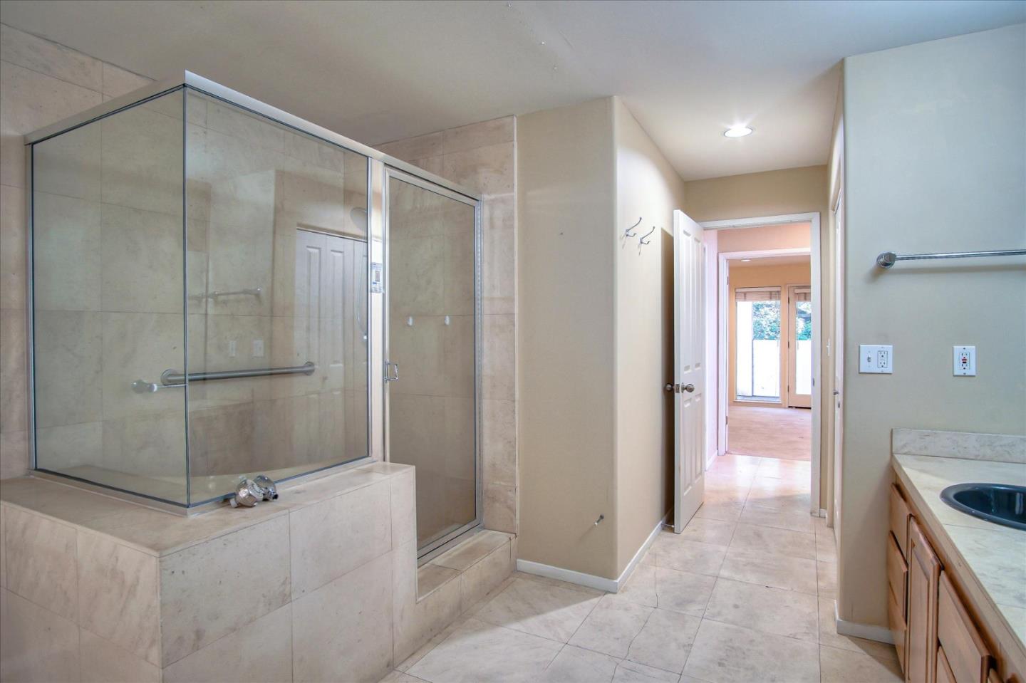 3435 Rio Road Carmel, CA 93923 - Photo 57 of 69 a bathroom with a shower and a sink