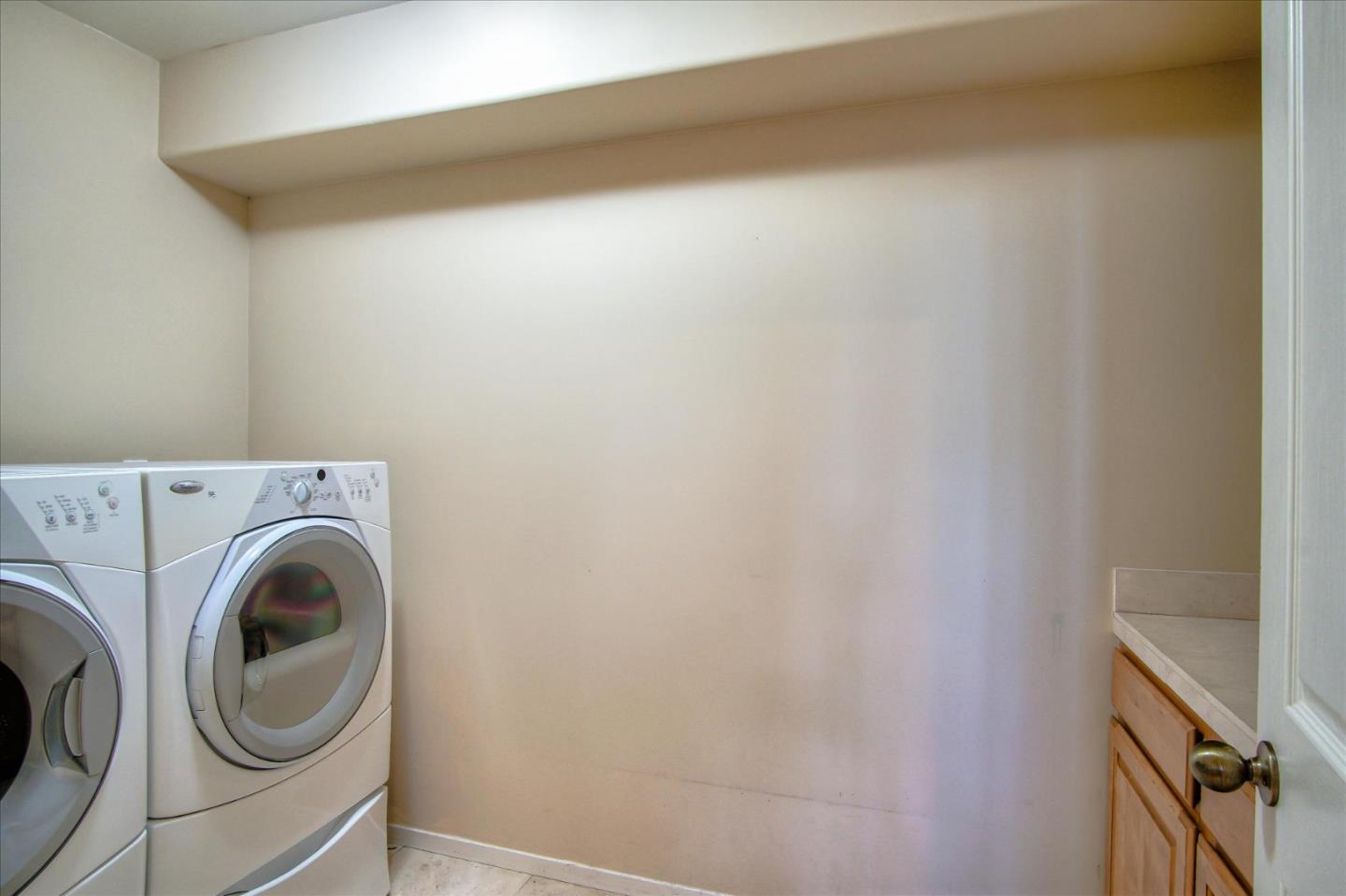 3435 Rio Road Carmel, CA 93923 - Photo 60 of 69 a utility room with dryer and washer