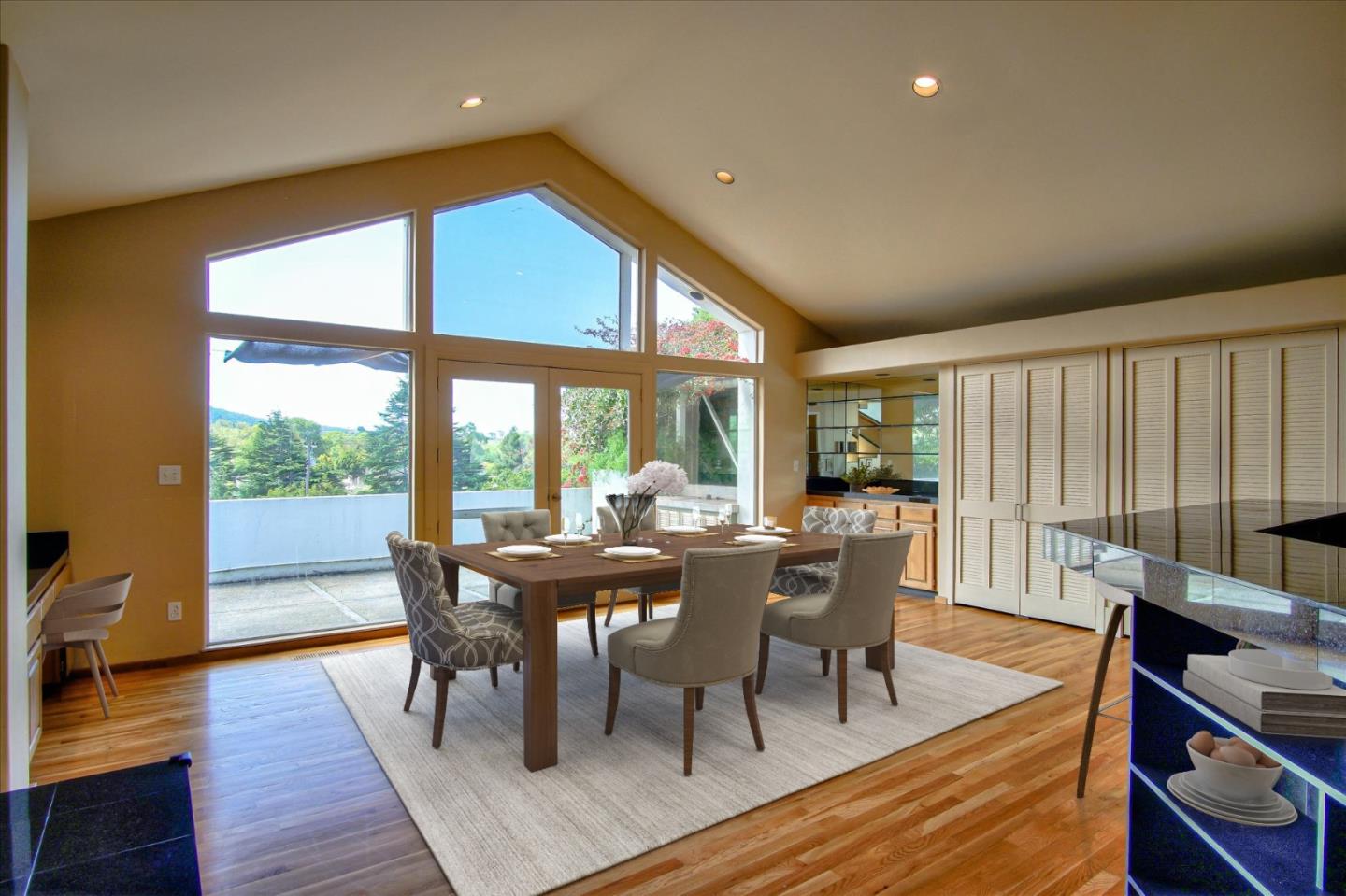 3435 Rio Road Carmel, CA 93923 - Photo 9 of 69 a view of a dining room with furniture window and wooden floor