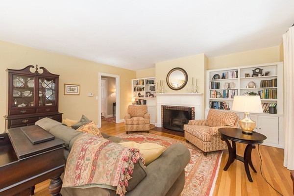 18 Woodside Road Topsfield, MA 01983 - Photo 11 of 30 a bed room with a bed and a fireplace