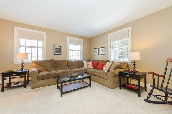 18 Woodside Road Topsfield, MA 01983 - Photo 12 of 30 a living room with furniture and a window