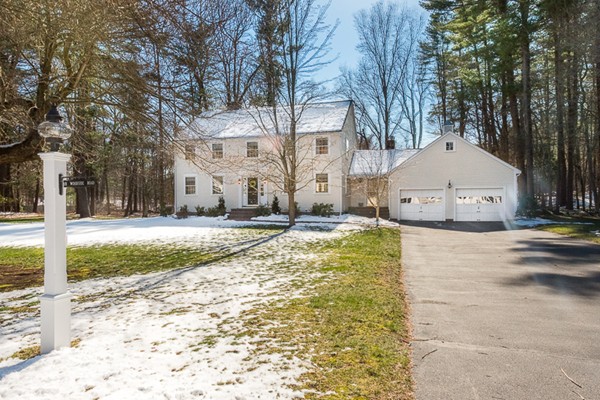 18 Woodside Road Topsfield, MA 01983 - Photo 2 of 30 a front view of a house with a yard