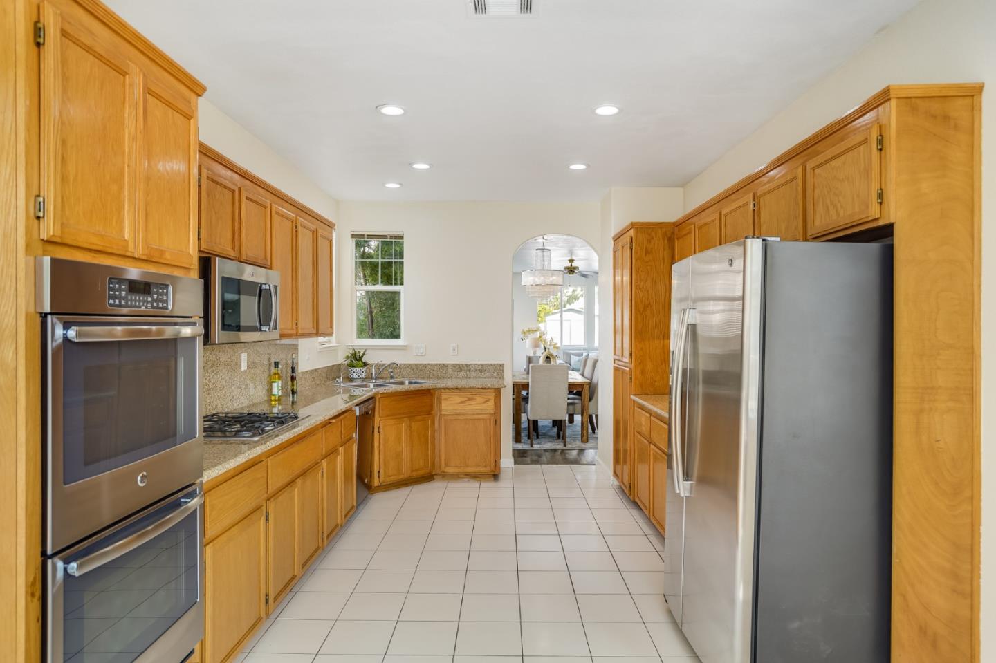 330 Titan Way Hercules, CA 94547 - Photo 12 of 37 a kitchen with stainless steel appliances granite countertop a refrigerator and a sink