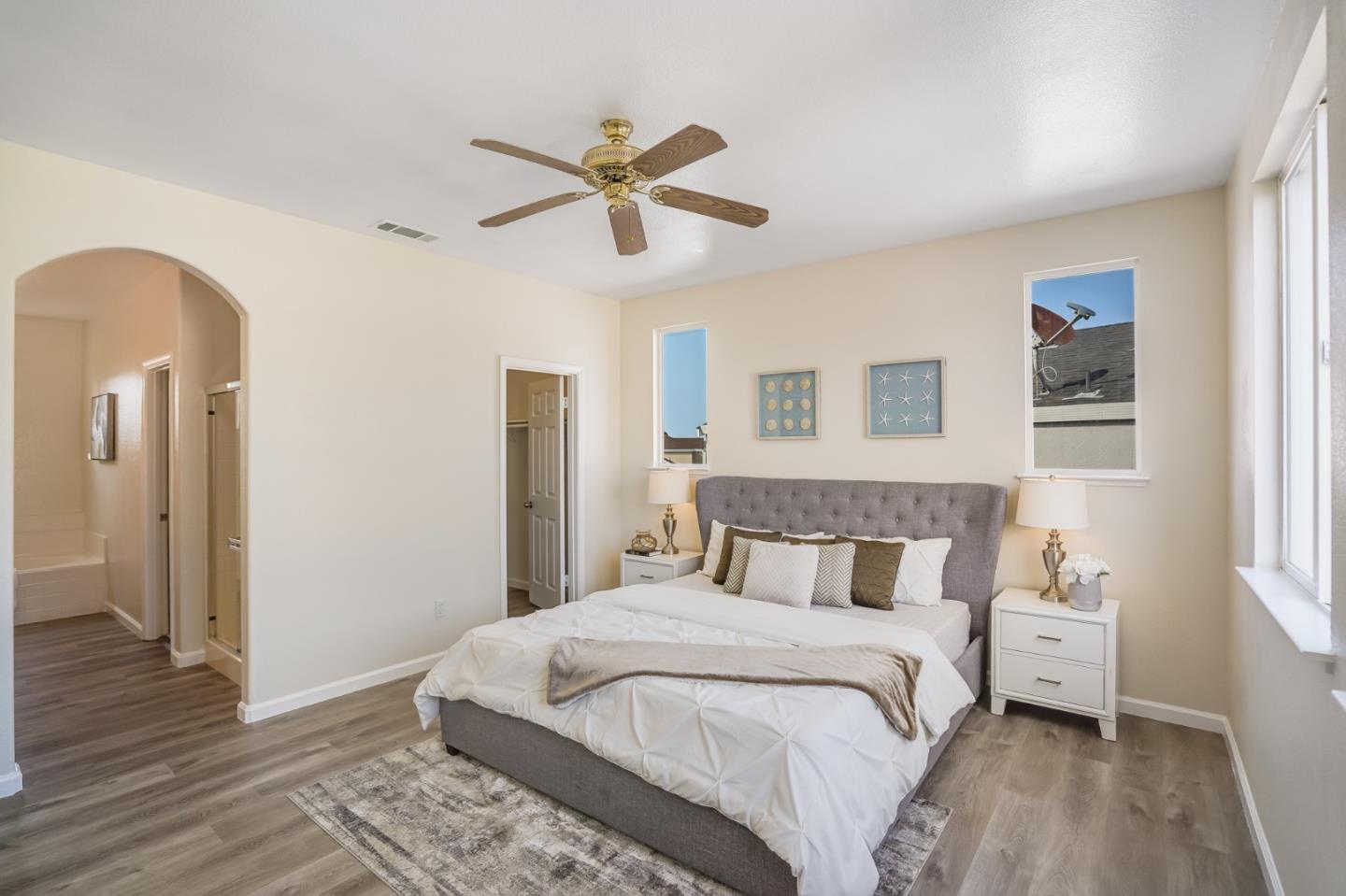 330 Titan Way Hercules, CA 94547 - Photo 22 of 37 a bedroom with a bed and wooden floor