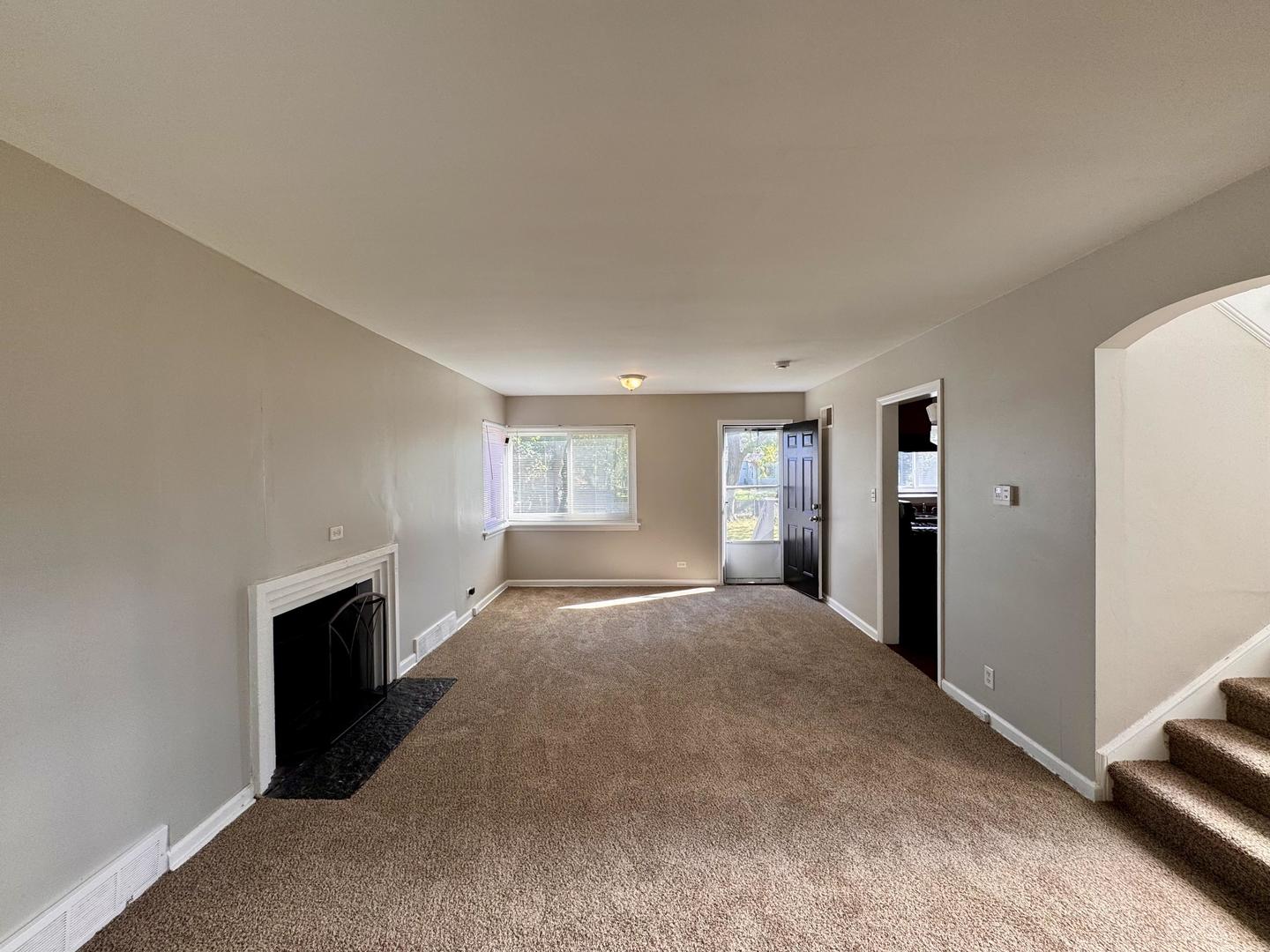 16727 Head Avenue Hazel Crest, IL 60429 - Photo 2 of 22 a view of an empty room with window and a bedroom