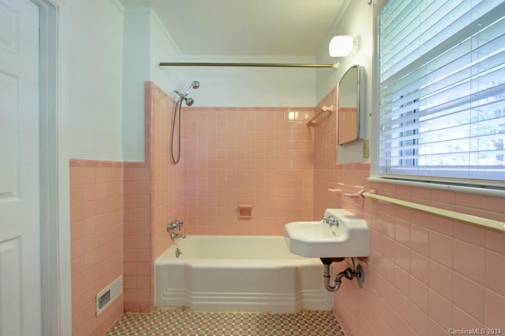 538 Scaleybark Road Charlotte, NC 28209 - Photo 13 of 20 a bathroom with a sink a bathtub and a shower