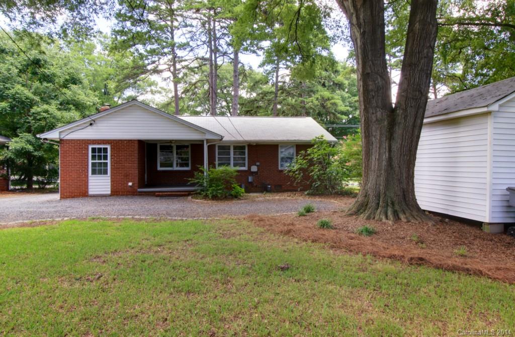 538 Scaleybark Road Charlotte, NC 28209 - Photo 17 of 20 a front view of a house with a garden