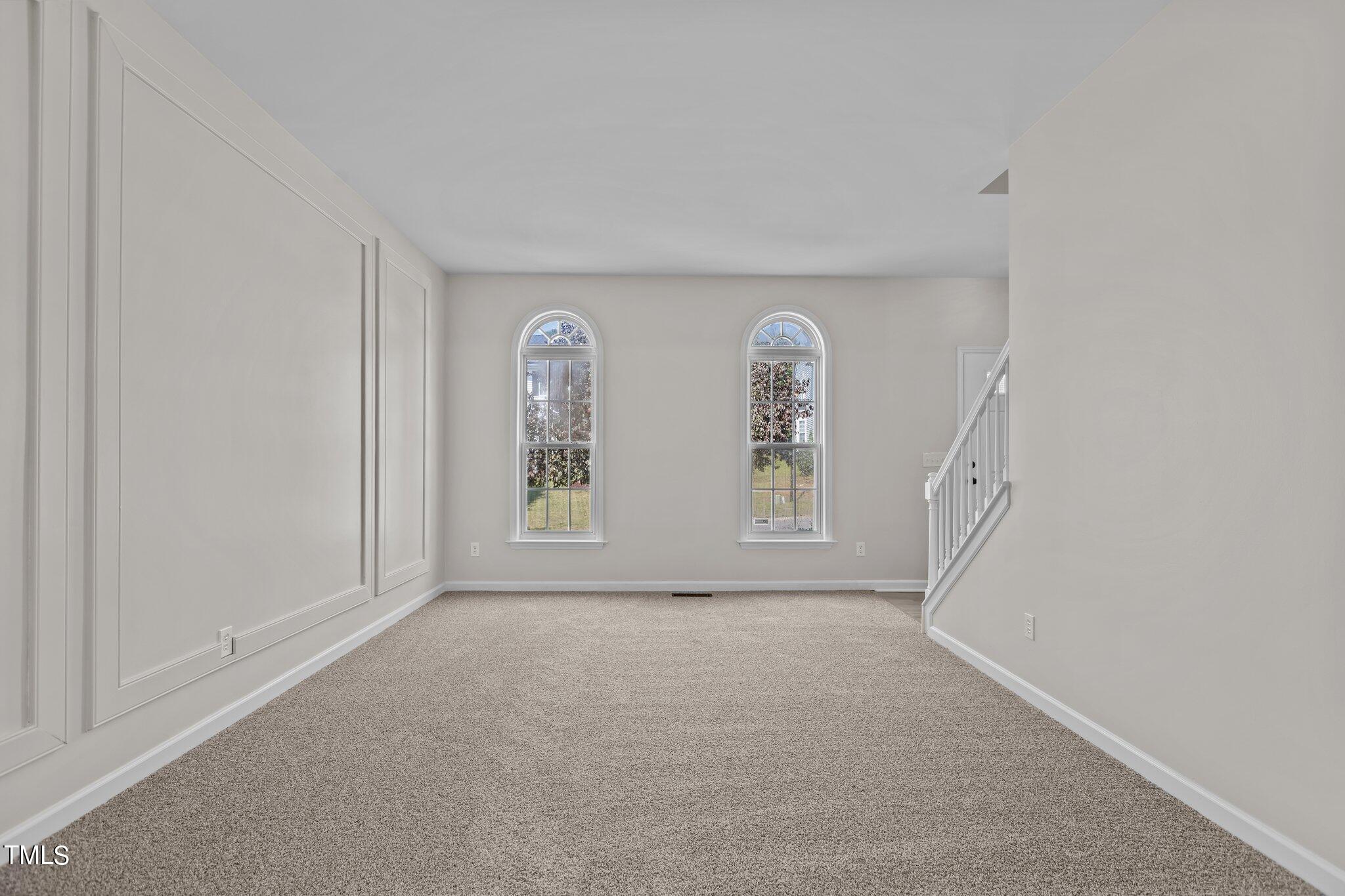 3225 Forest Mill Circle Raleigh, NC 27616 - Photo 15 of 36 an empty room with windows