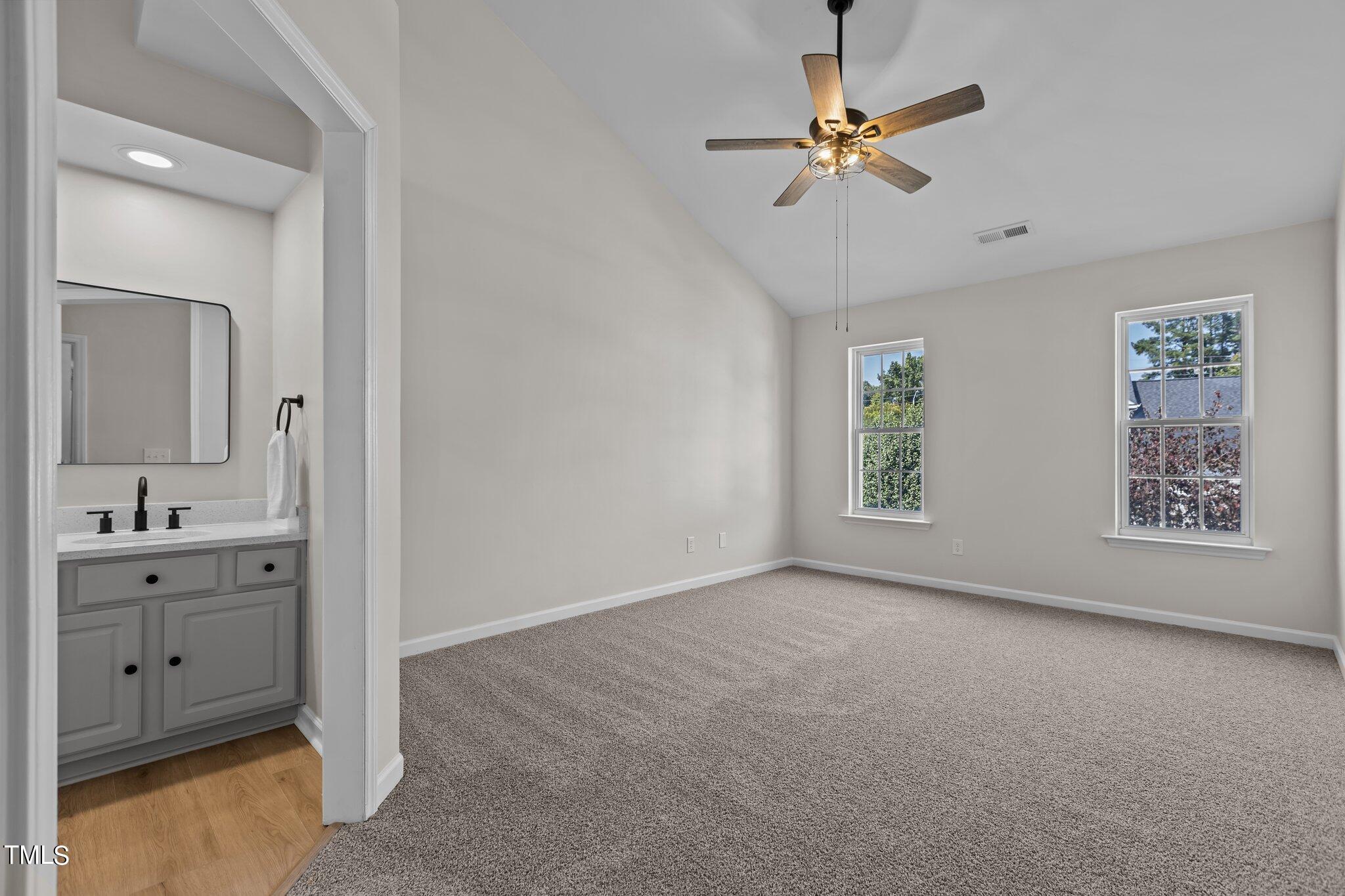 3225 Forest Mill Circle Raleigh, NC 27616 - Photo 19 of 36 a view of an empty room with a window