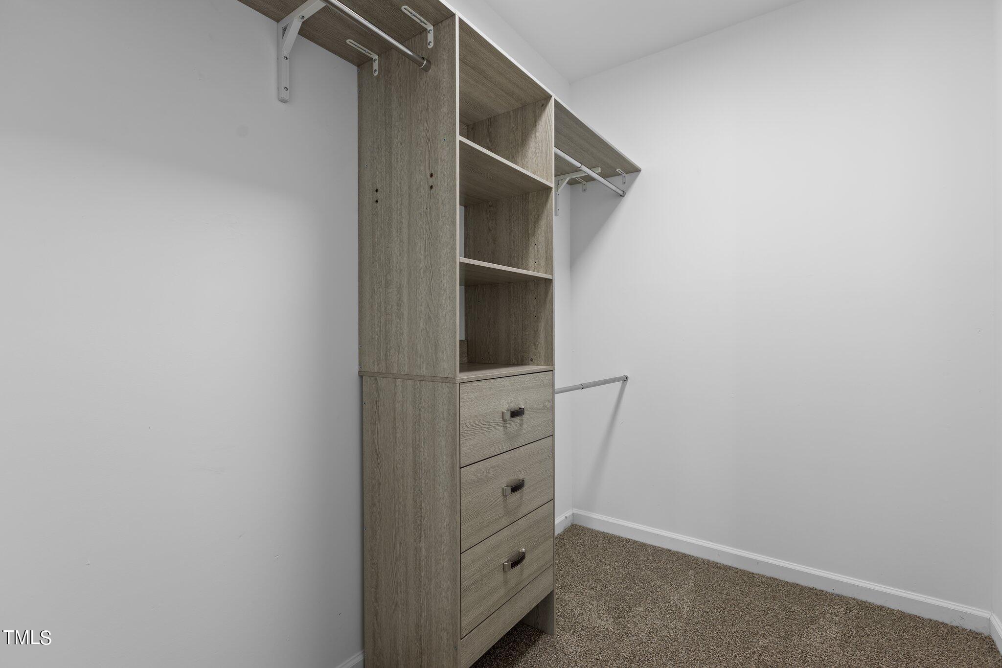 3225 Forest Mill Circle Raleigh, NC 27616 - Photo 22 of 36 a view of walk in closet
