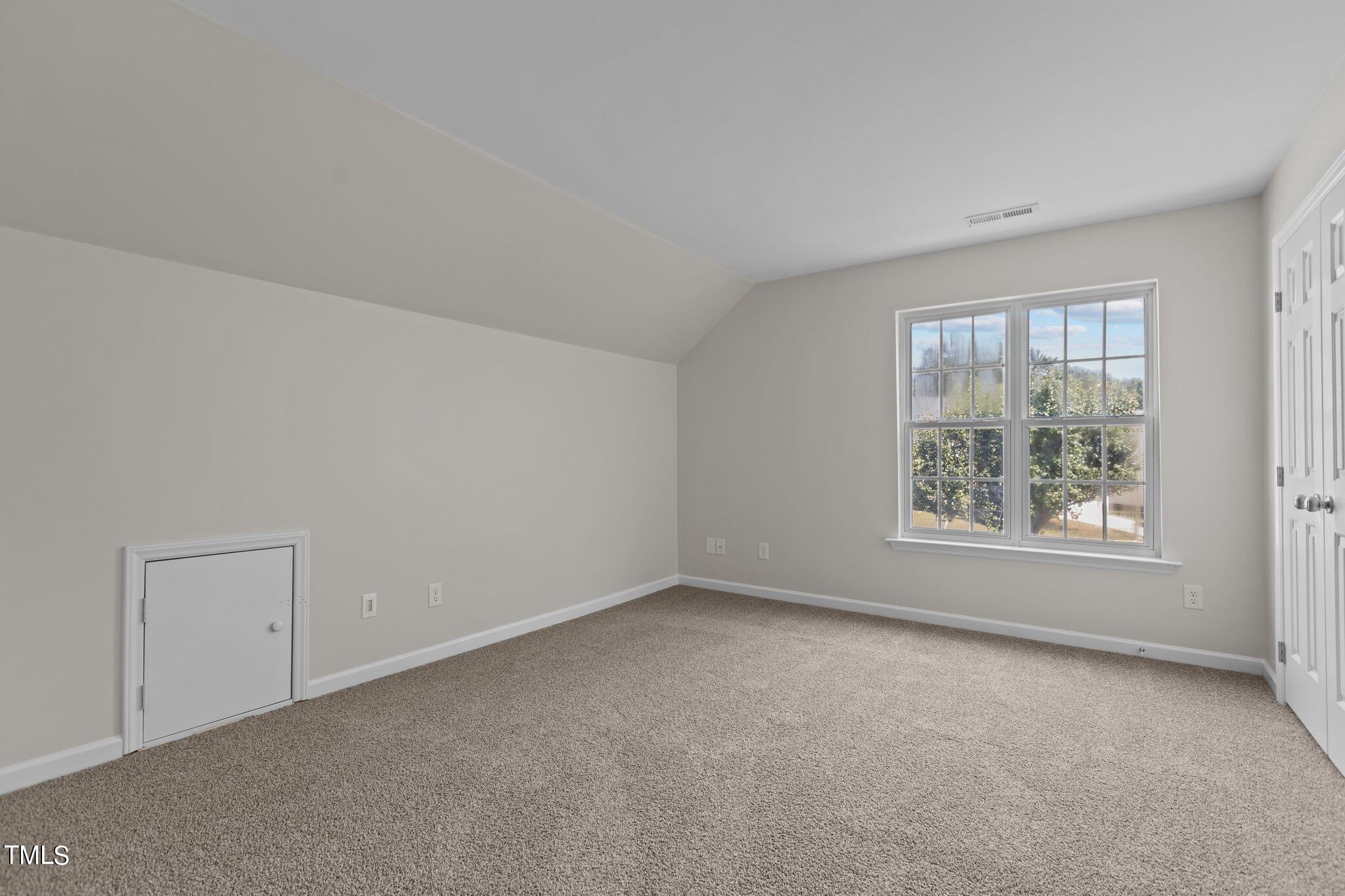 3225 Forest Mill Circle Raleigh, NC 27616 - Photo 26 of 36 an empty room with a window