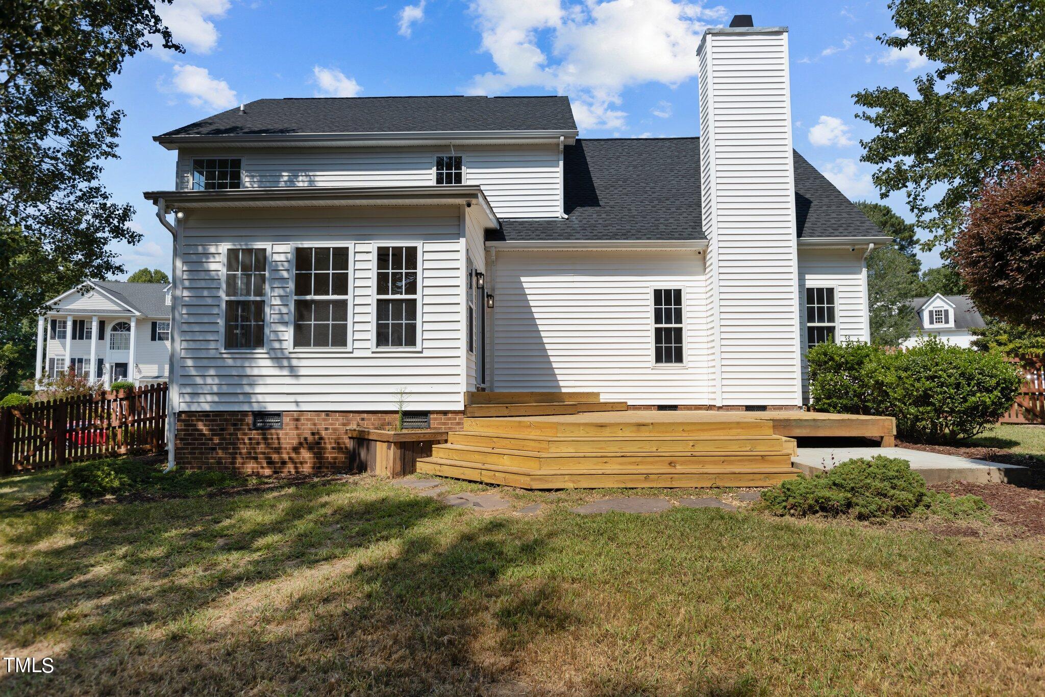 3225 Forest Mill Circle Raleigh, NC 27616 - Photo 29 of 36 a front view of a house with a yard