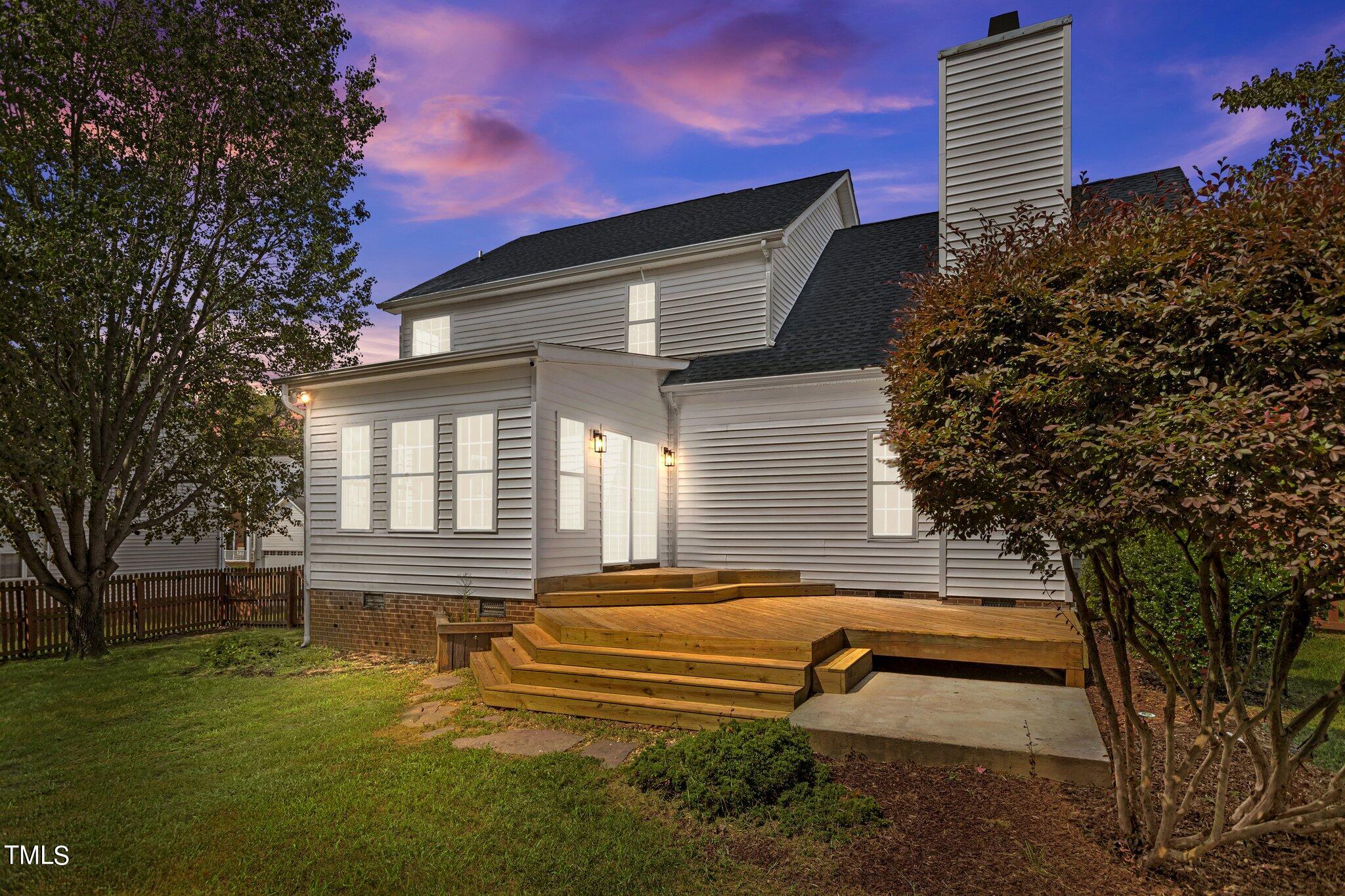 3225 Forest Mill Circle Raleigh, NC 27616 - Photo 32 of 36 a front view of a house with a garden