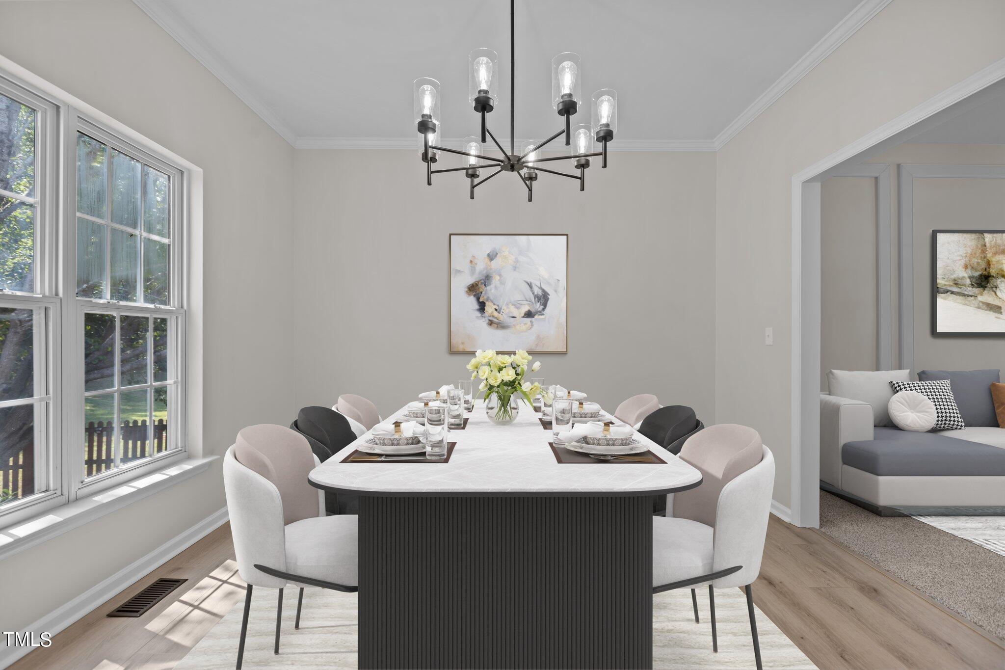 3225 Forest Mill Circle Raleigh, NC 27616 - Photo 5 of 36 a view of a dining room with furniture window and outside view