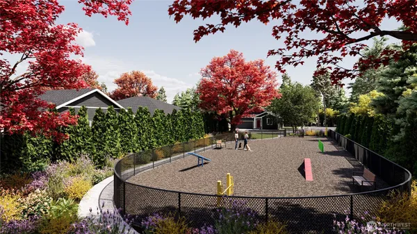 a terrace with outdoor seating and trees