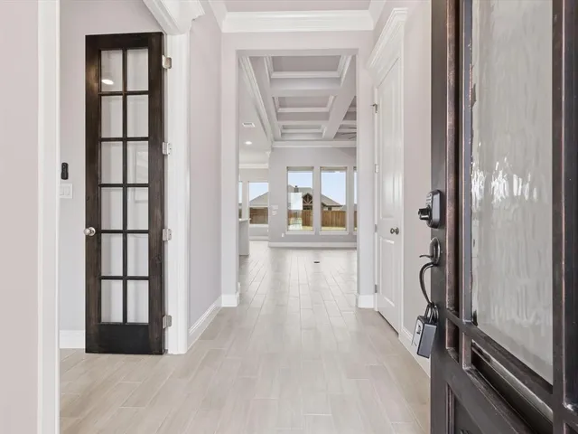 a view of a bathroom from the hallway