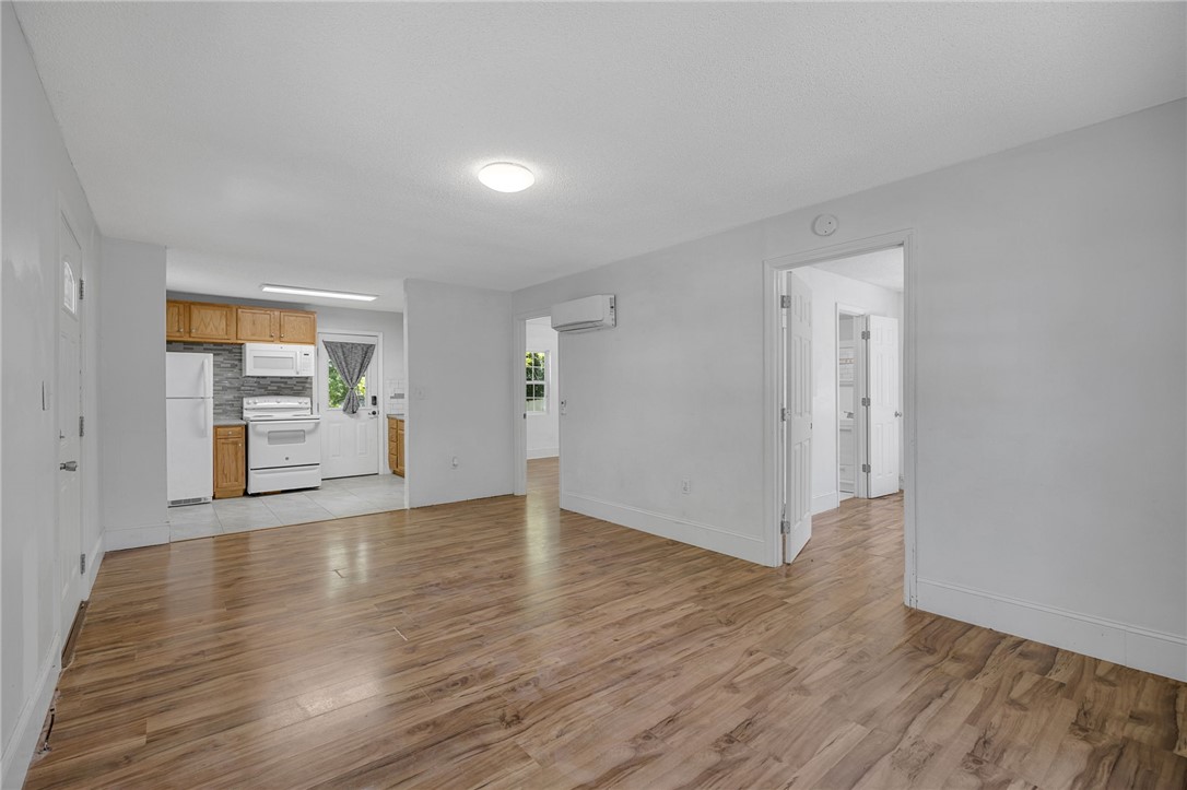 1616 Meadow Brook Circle Anderson, SC 29624 - Photo 6 of 24 This bright and open-concept area blends living space with a functional kitchen.