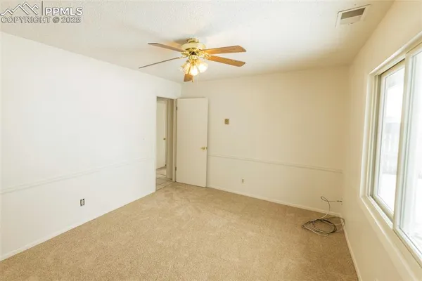 an empty room with windows